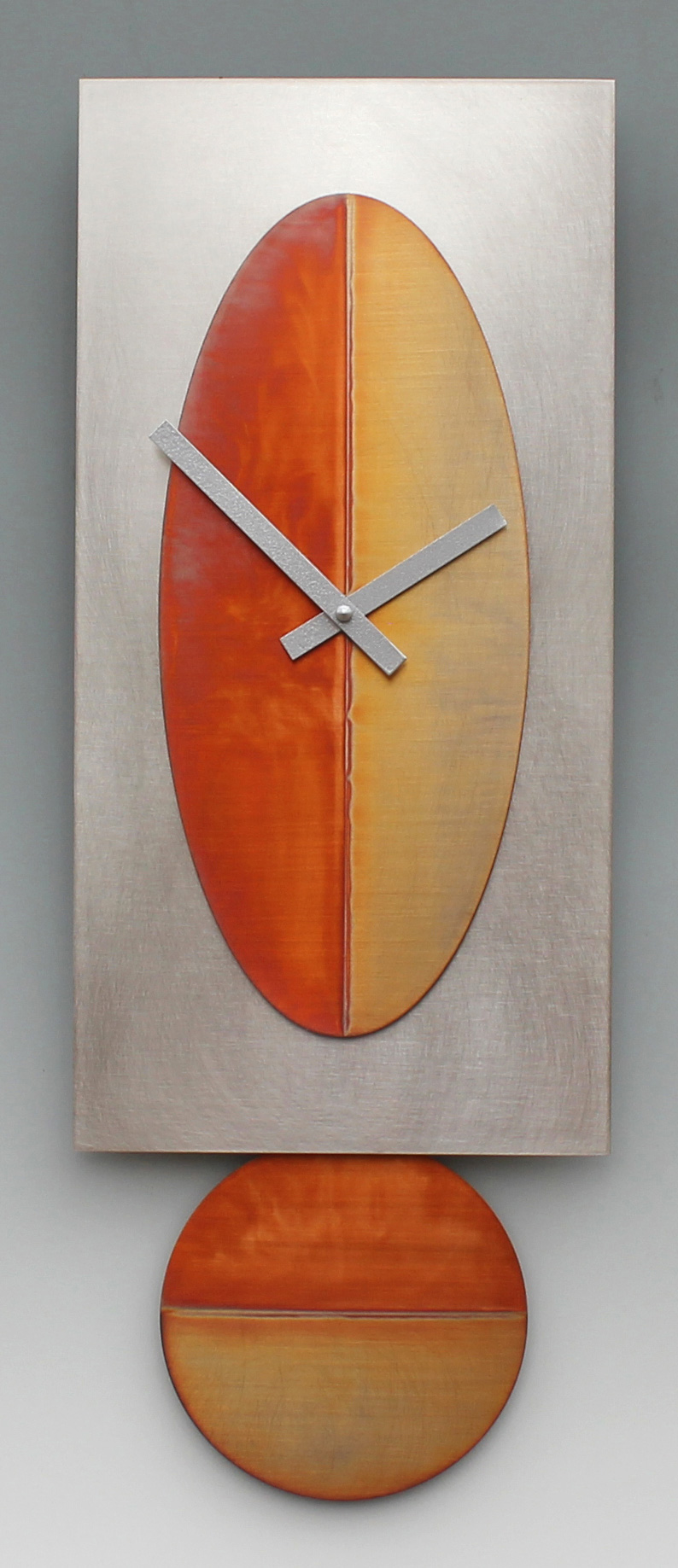 Leonie Lacouette: Steel/Copper Oval Pendulum Wall Clock | Rendezvous Gallery